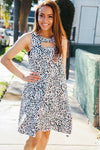 Be Bold Ivory Animal Print Peek-A-Boo Neck Dress