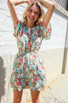 Get Whimsical Tropical Print Smocked Waist Neck Button Romper
