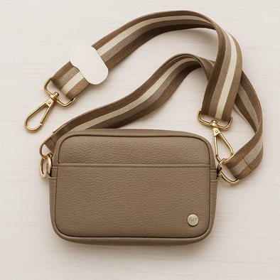 Tan purse with white and tan striped strap